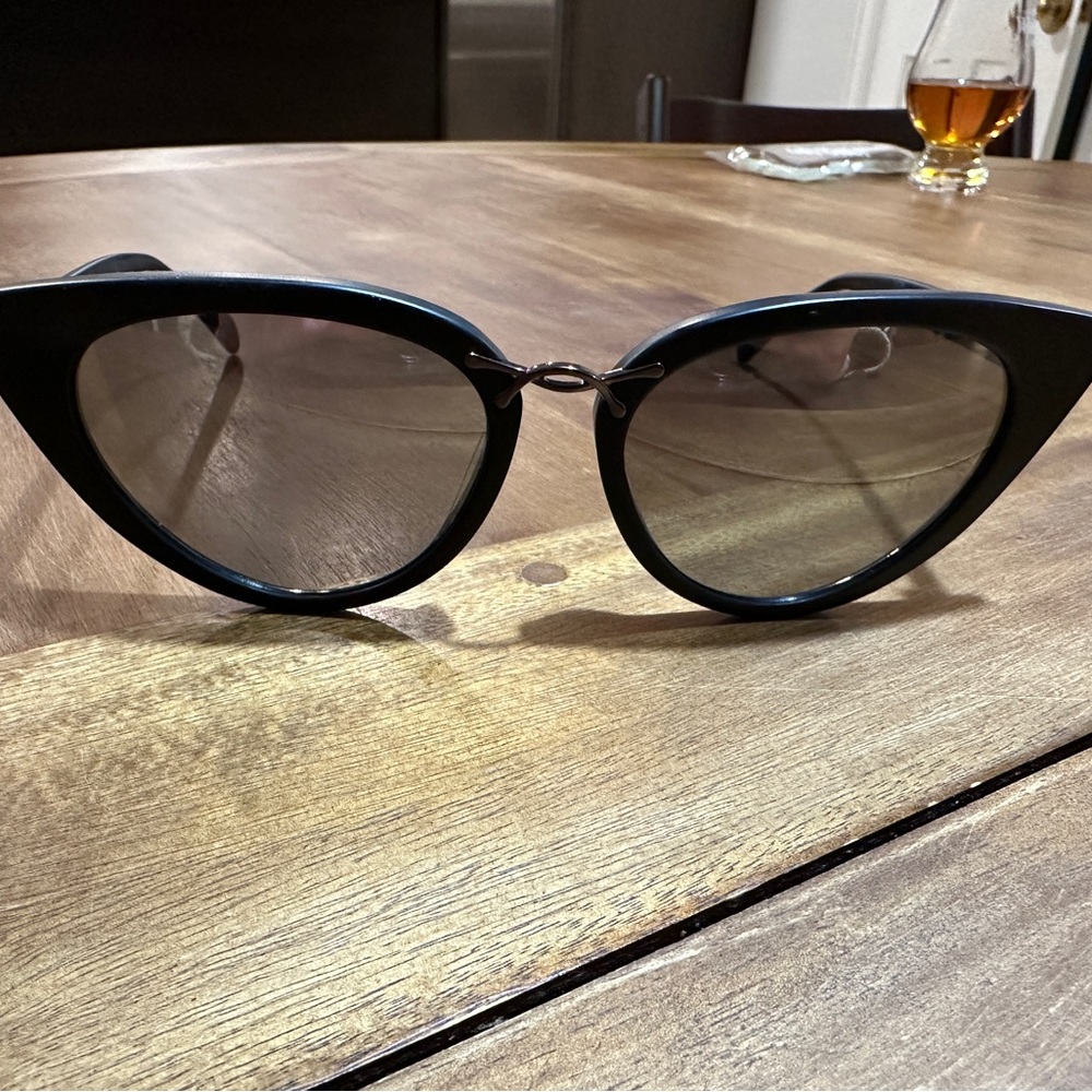 Oscar de la Renta X Morgenthal Fredrics Twist I sunglasses.